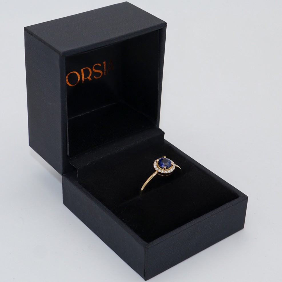 Anillo solitario con zafiro y brillantes