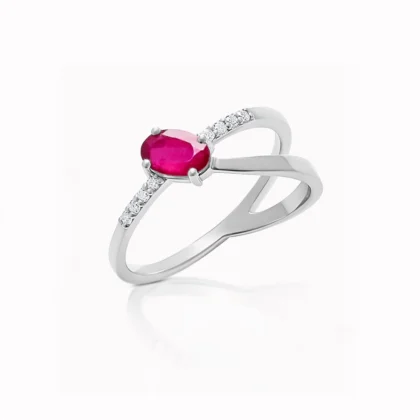 Anillo de oro blanco con doble brazo rubí oval y diamantes
