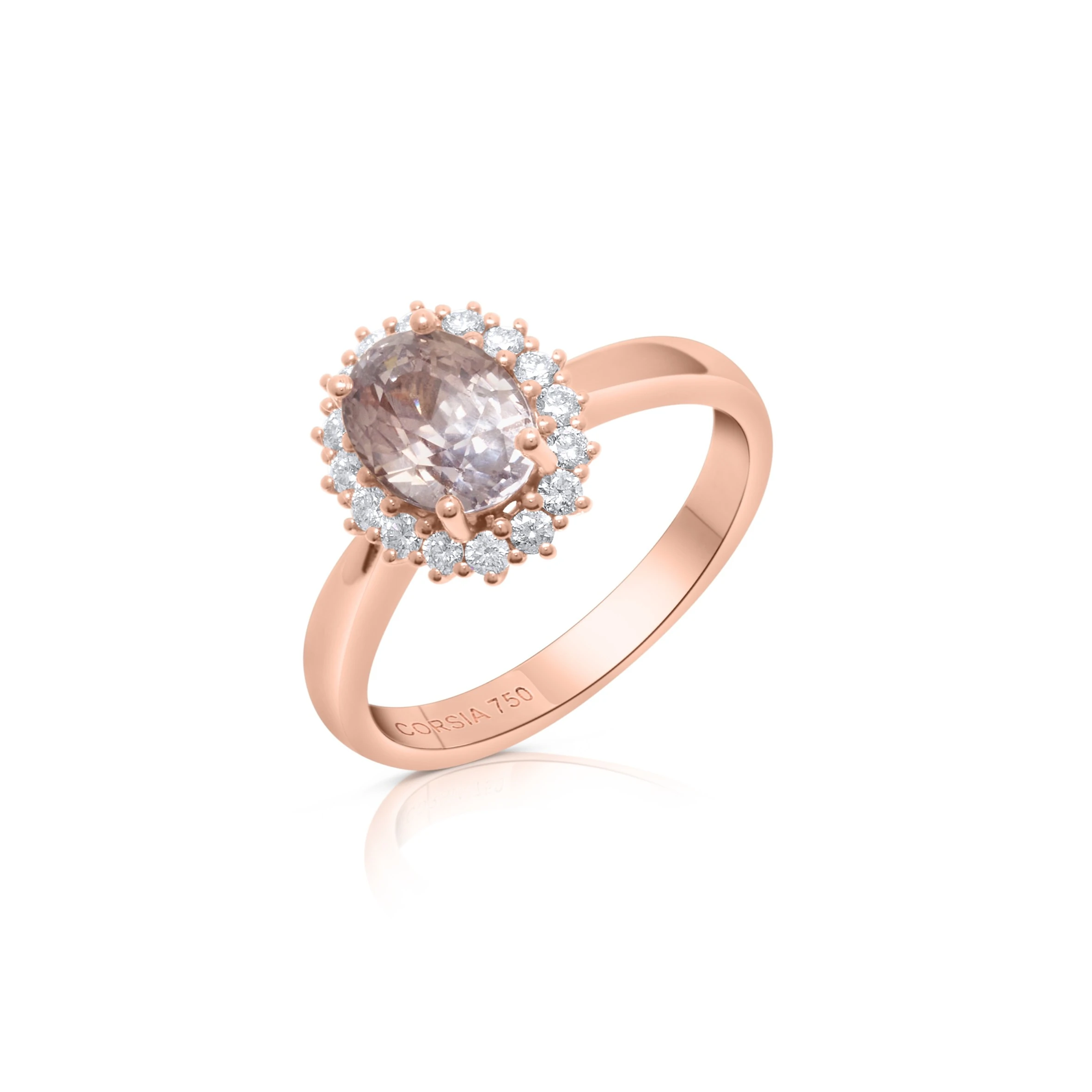 Anillo de oro rosa con zafiro natural rosa y orla de diamantes corsia