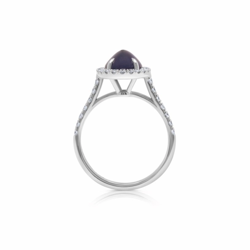 Anillo de zafiro oval cabujon con orla y brazo de diamantes oro blanco corsia